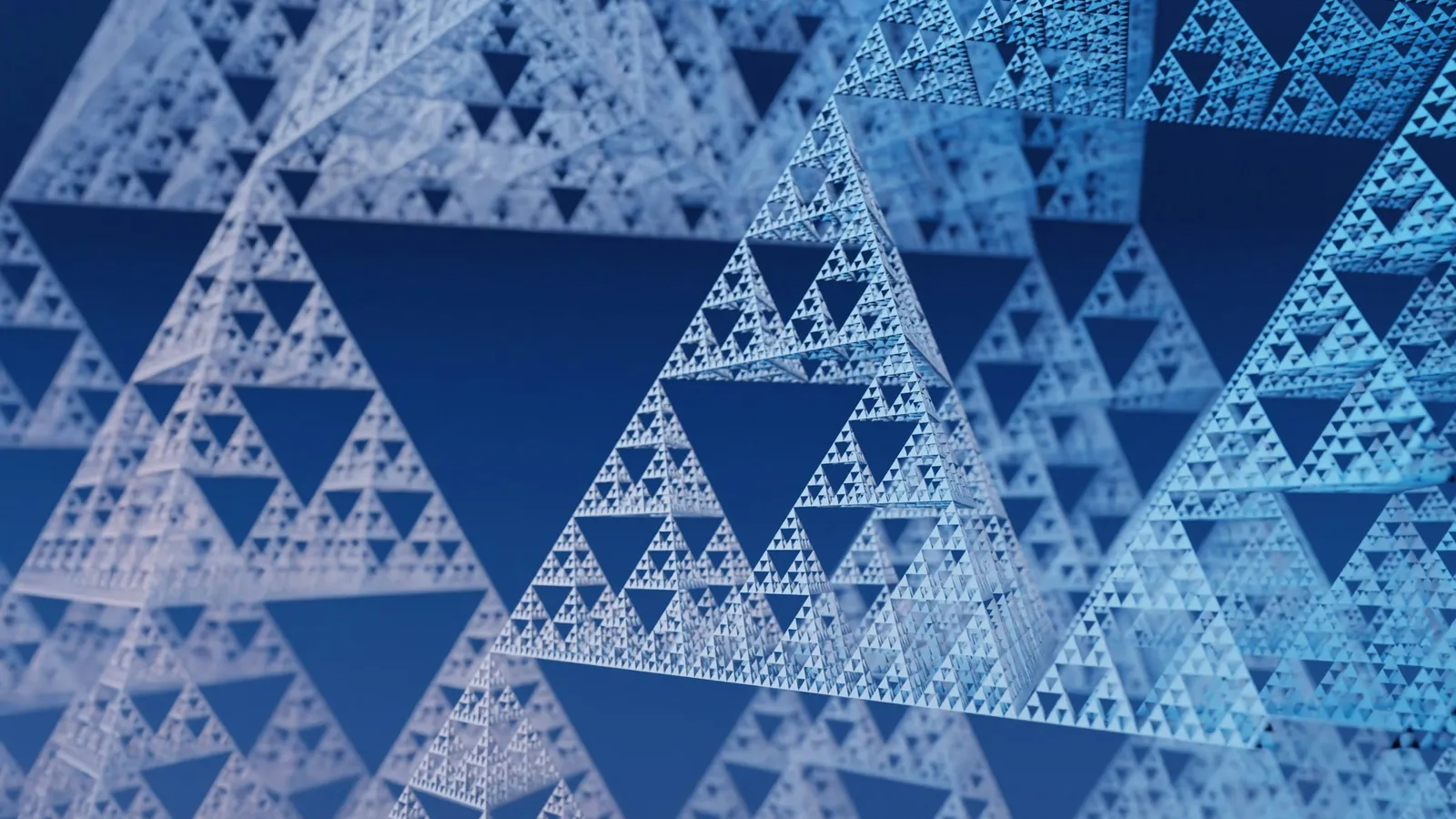 A blue fractal pattern of nested triangles