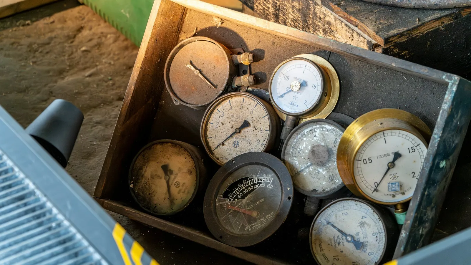 A box of old pressure gauges