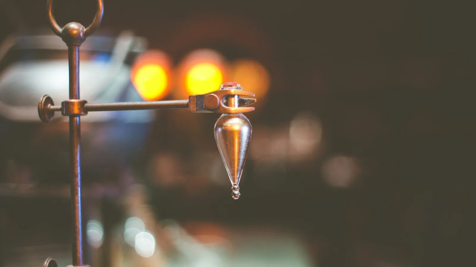 A burette clamped on a stand in a lab