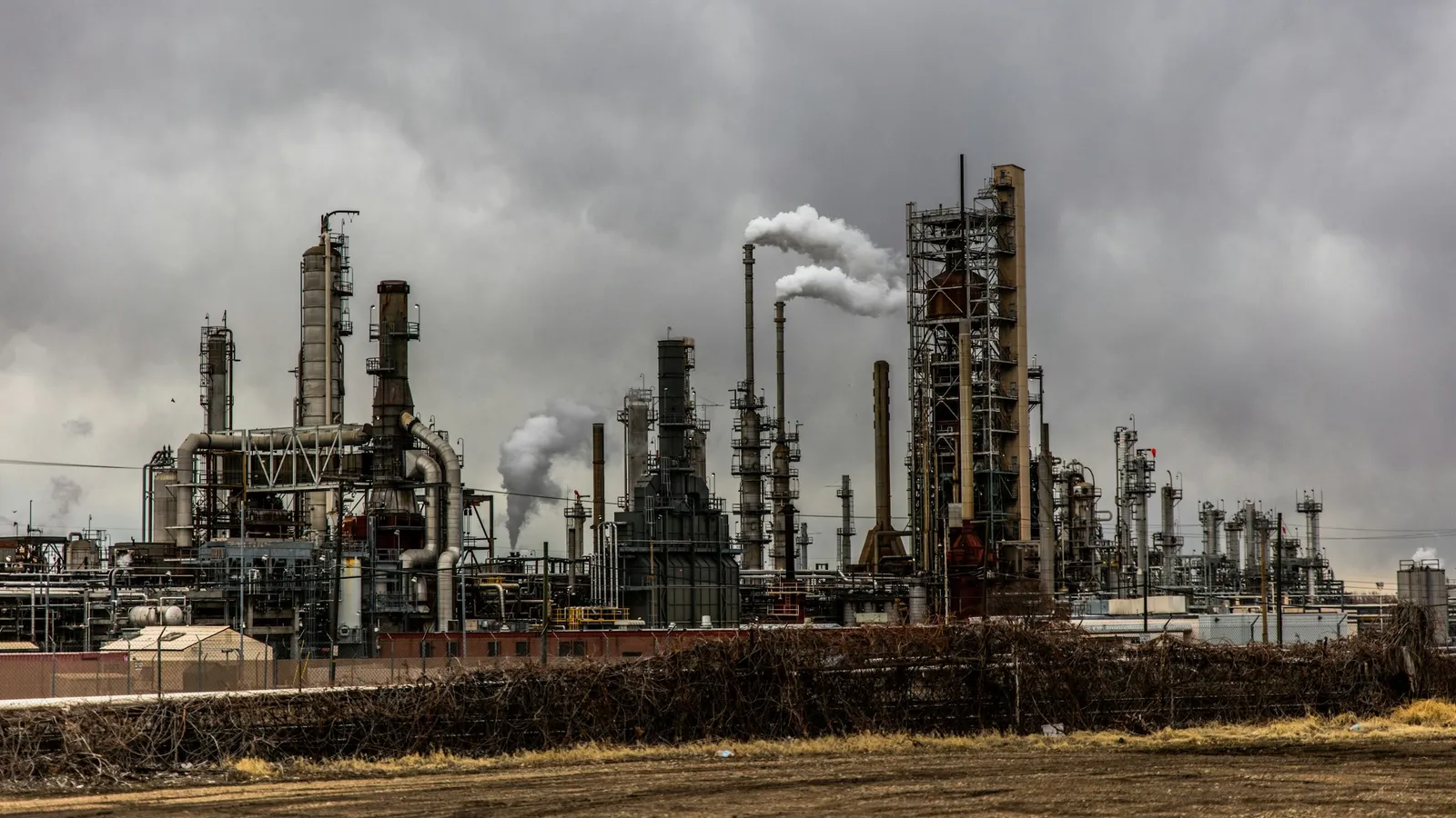 A chemical plant with towers and pipes