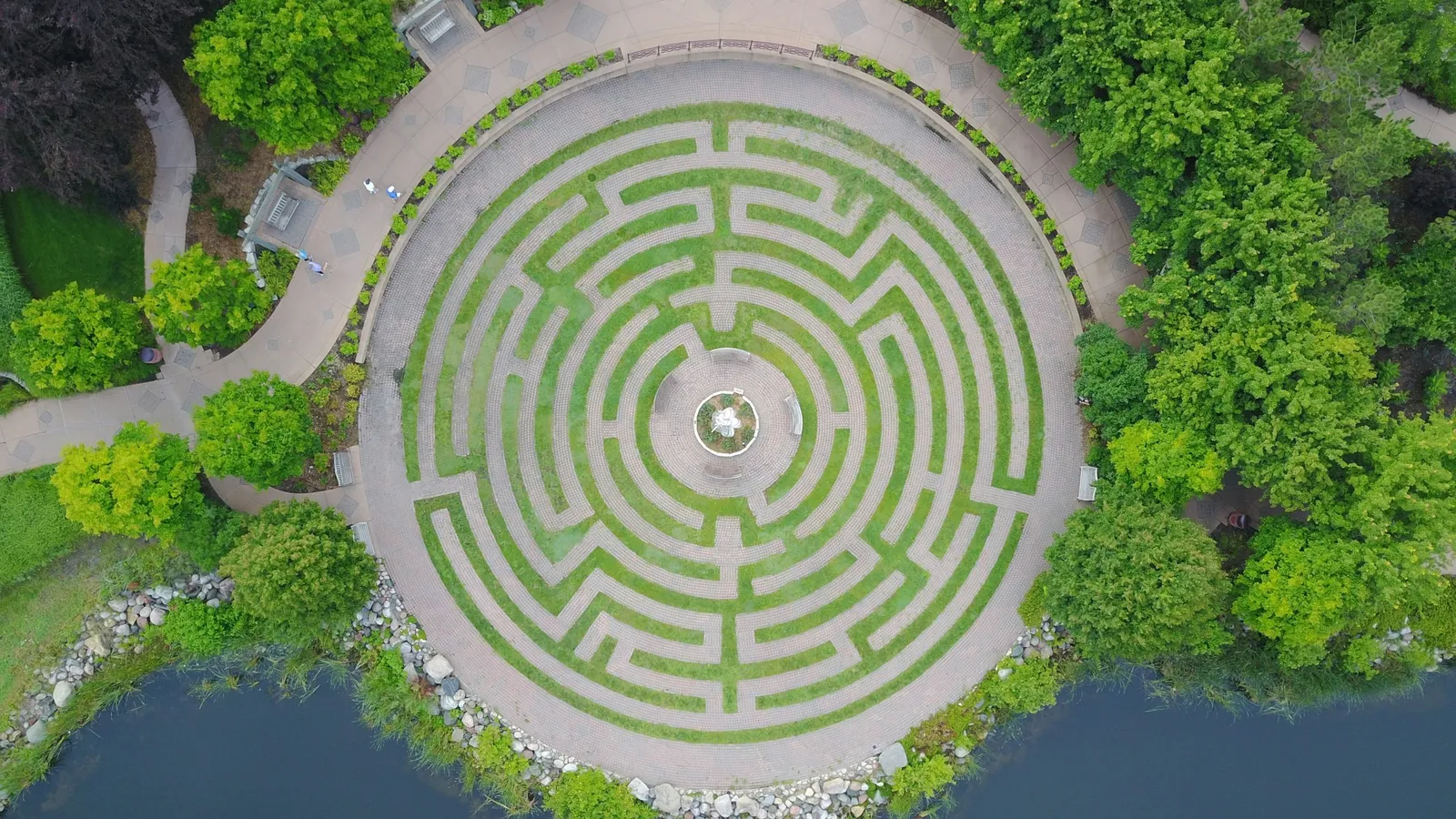 A circular garden maze seen from above