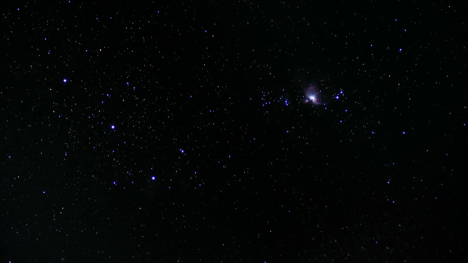 A dark night sky full of stars and constellations