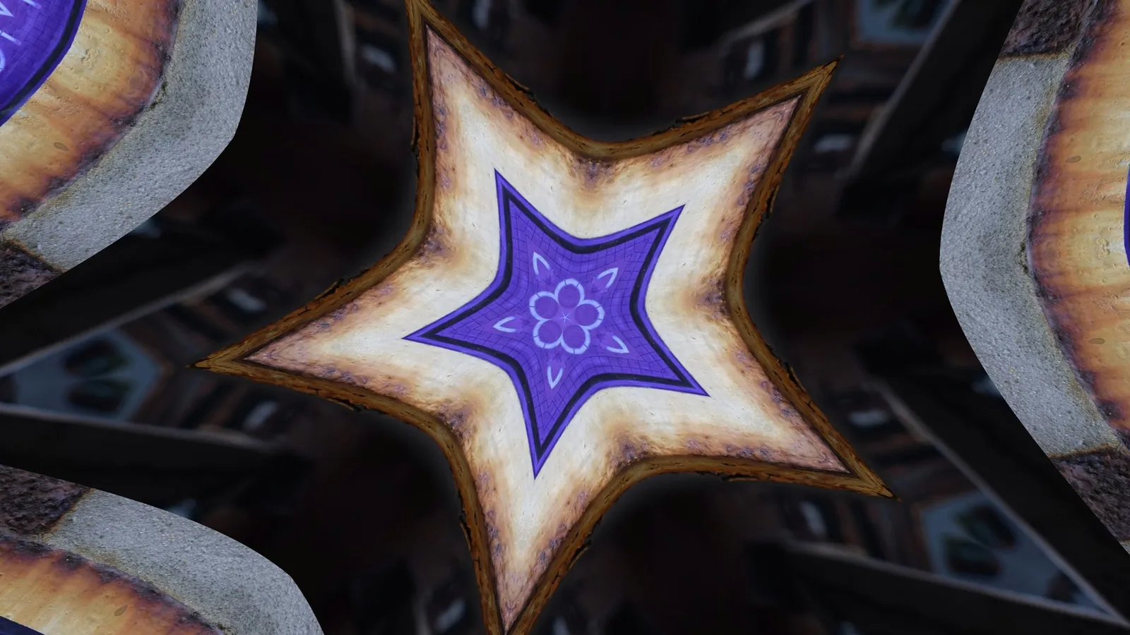 A five-pointed star inside an ornate pattern