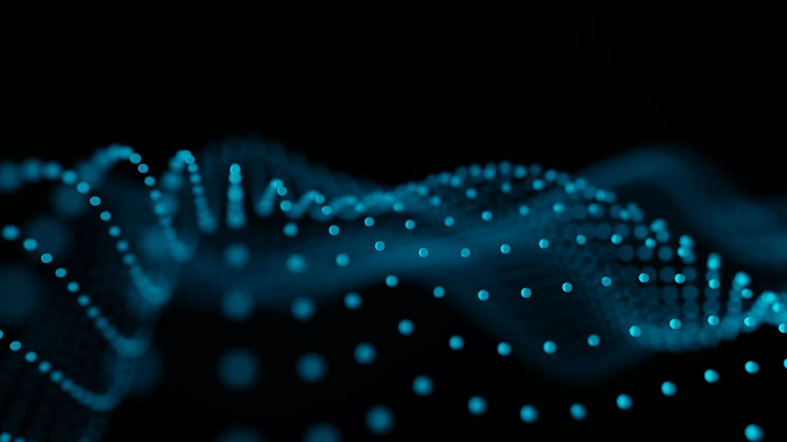 A flowing wave pattern of blue dots on black