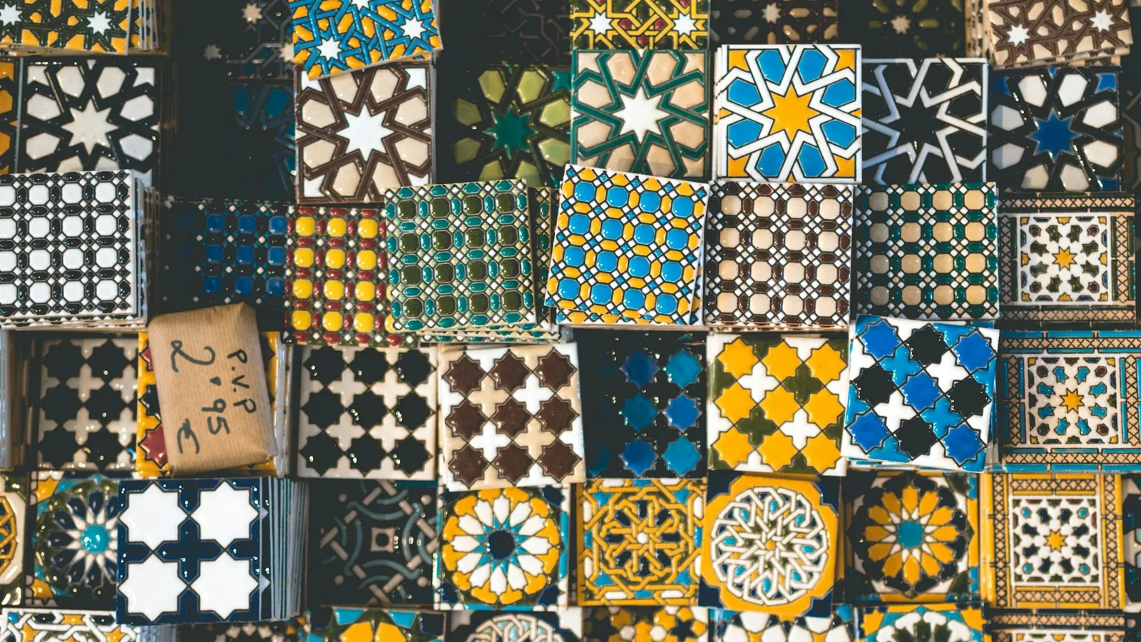 A grid of patterned square tiles