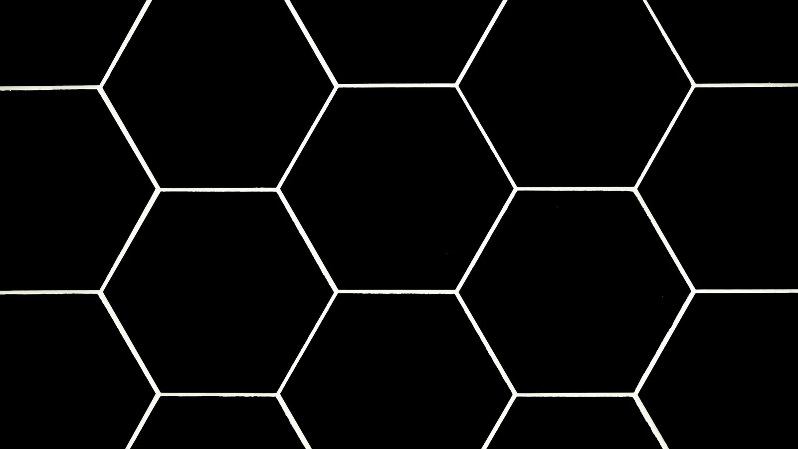 A grid of white hexagon outlines on black