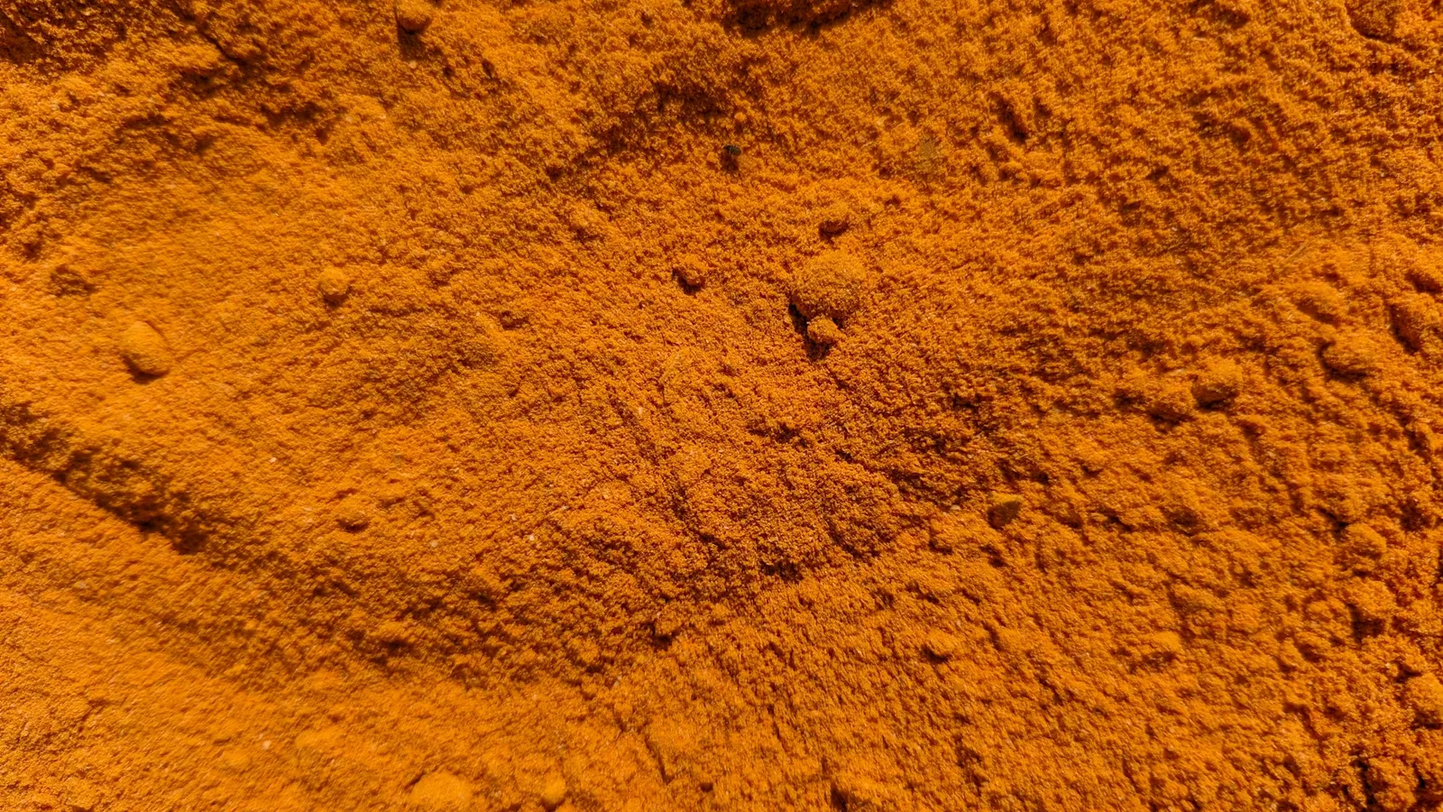 A heap of bright orange powder