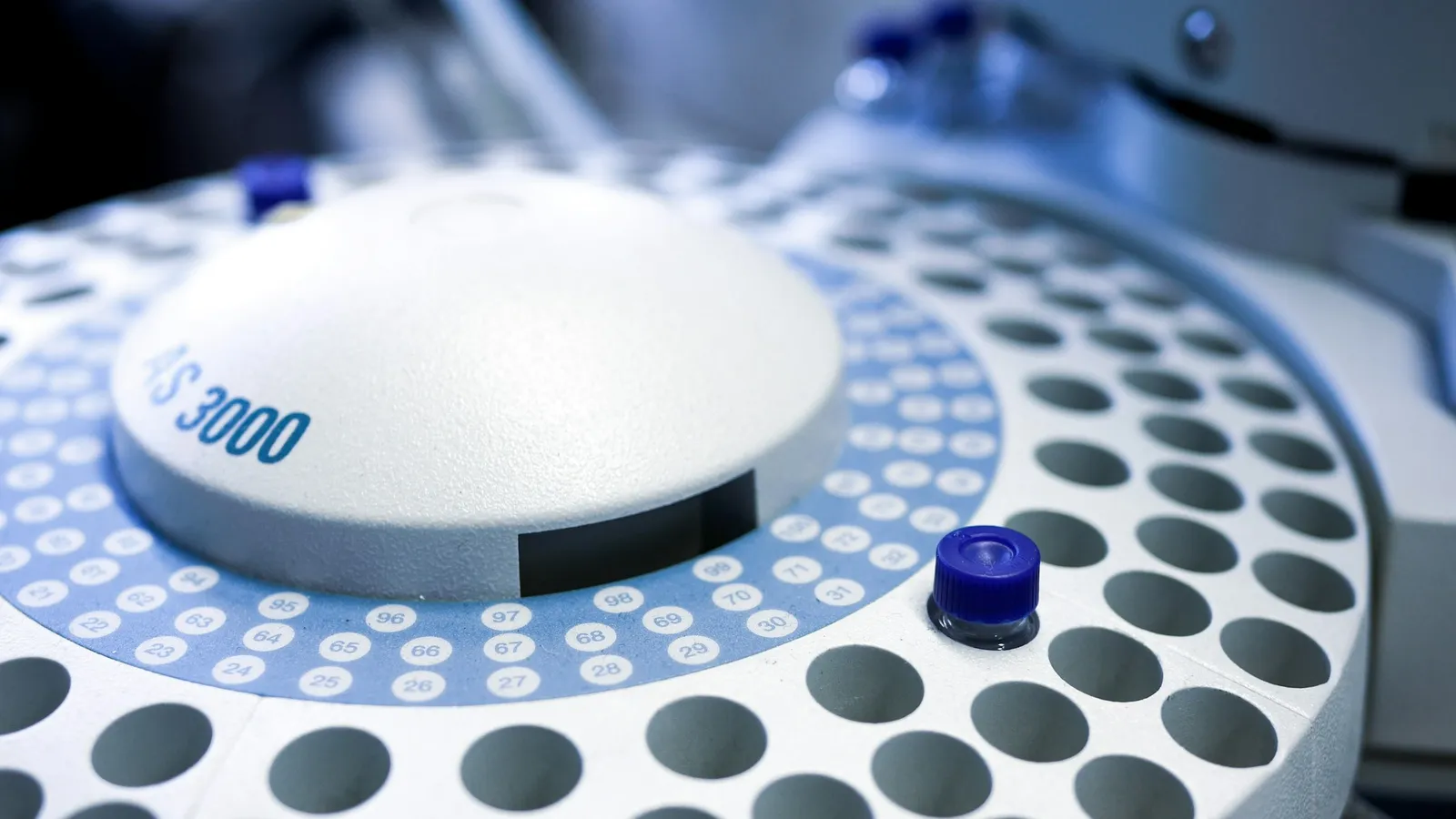 A laboratory centrifuge loaded with sample tubes