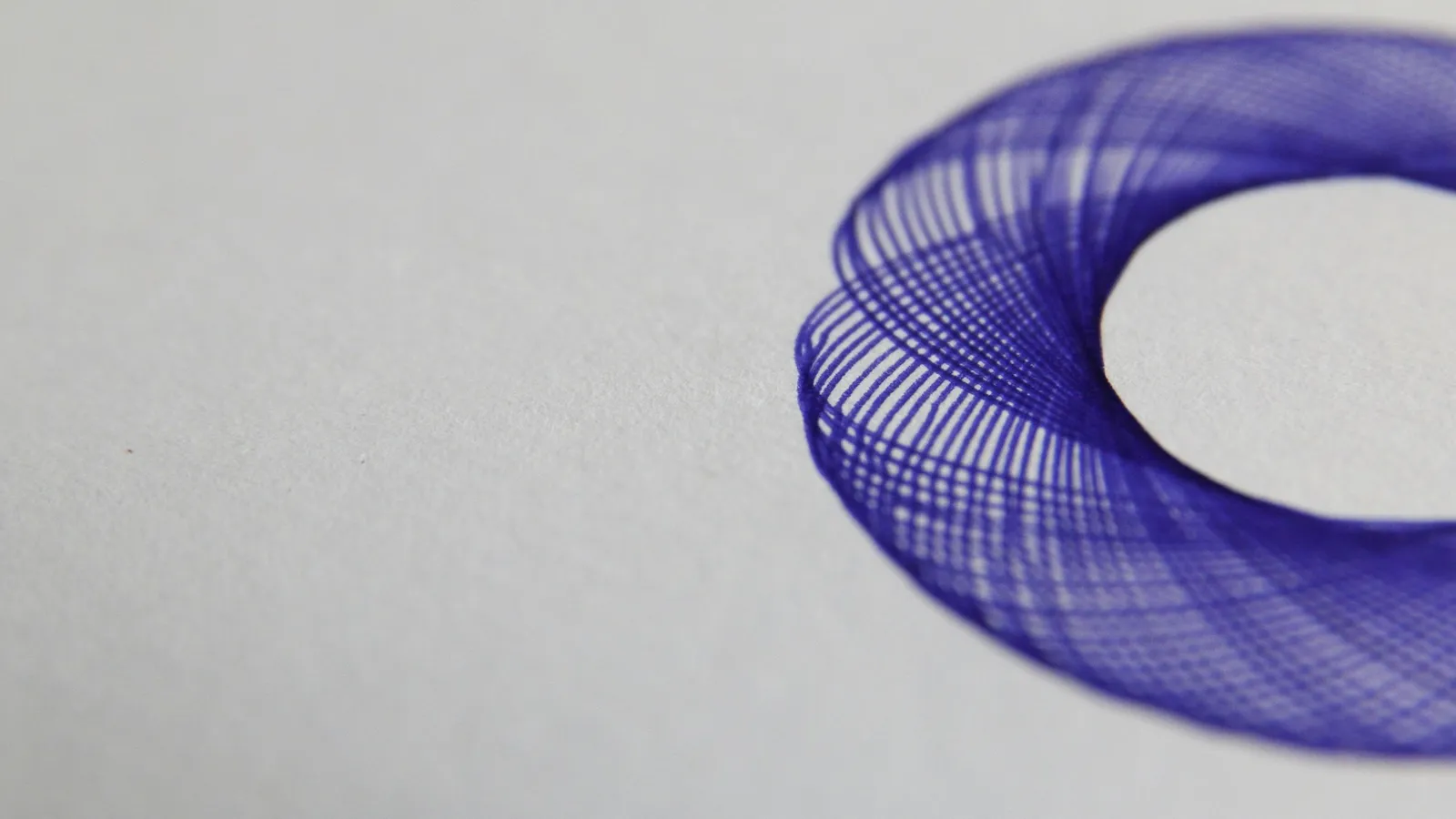 A looping curve traced in blue lines
