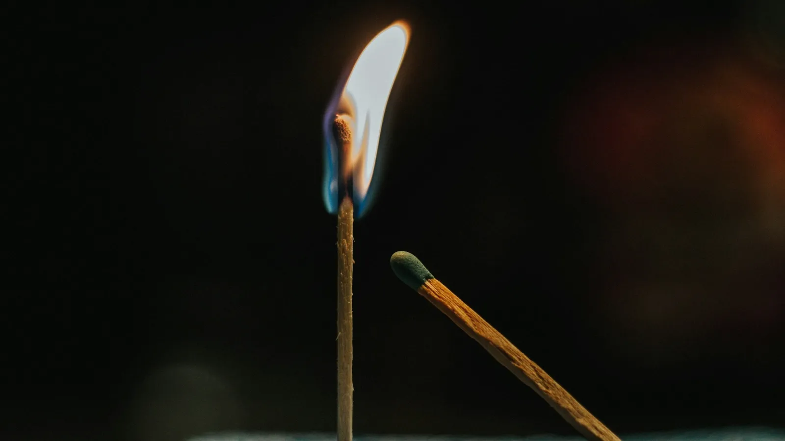 A matchstick bursting into flame