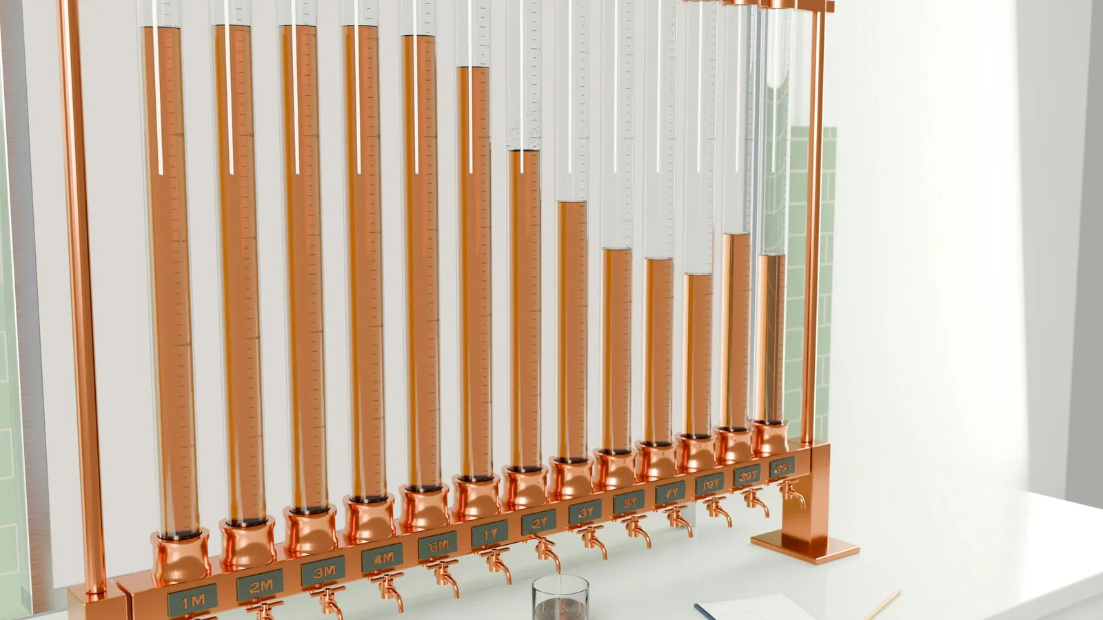 A row of glass tubes with copper fittings