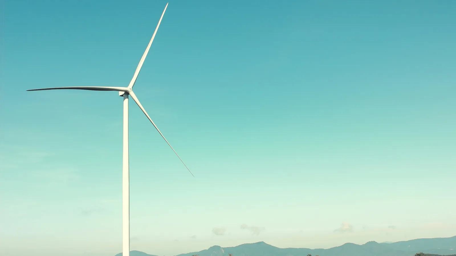 A single wind turbine with long rotating blades