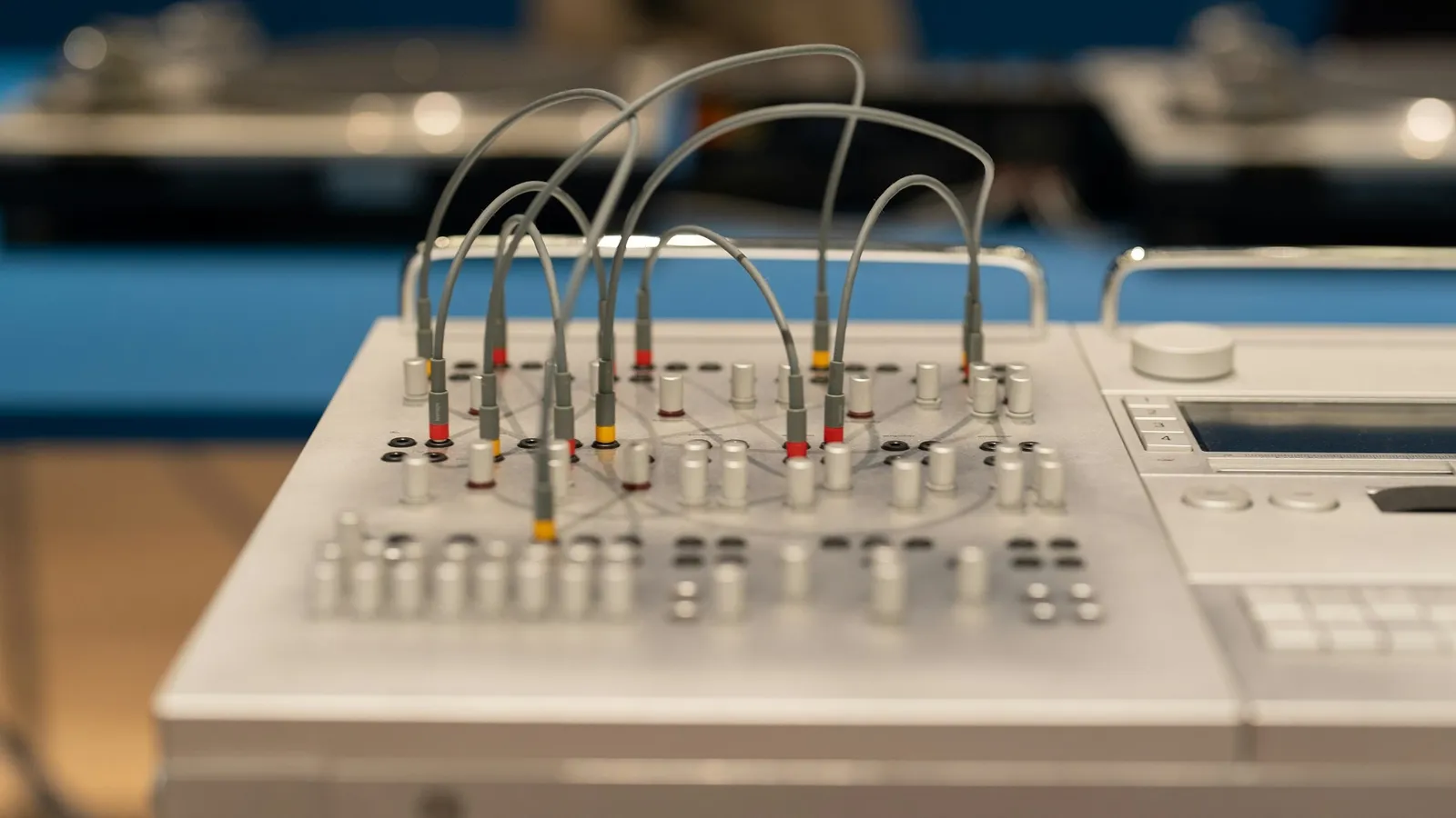 A small electronics test board with wires