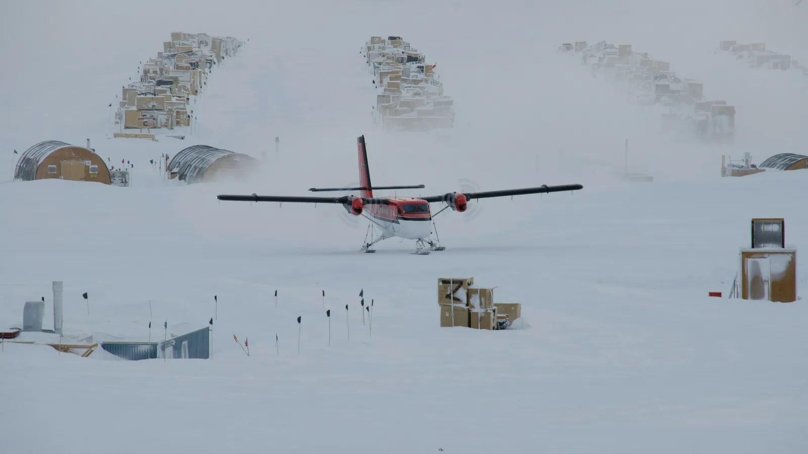 A small plane on the snow at a polar research station