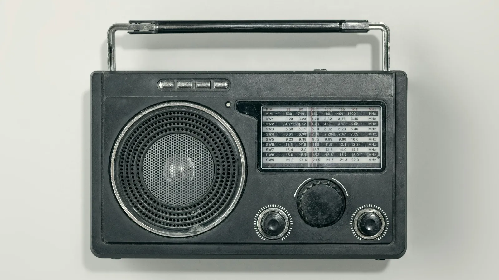 A small portable radio with a telescopic aerial