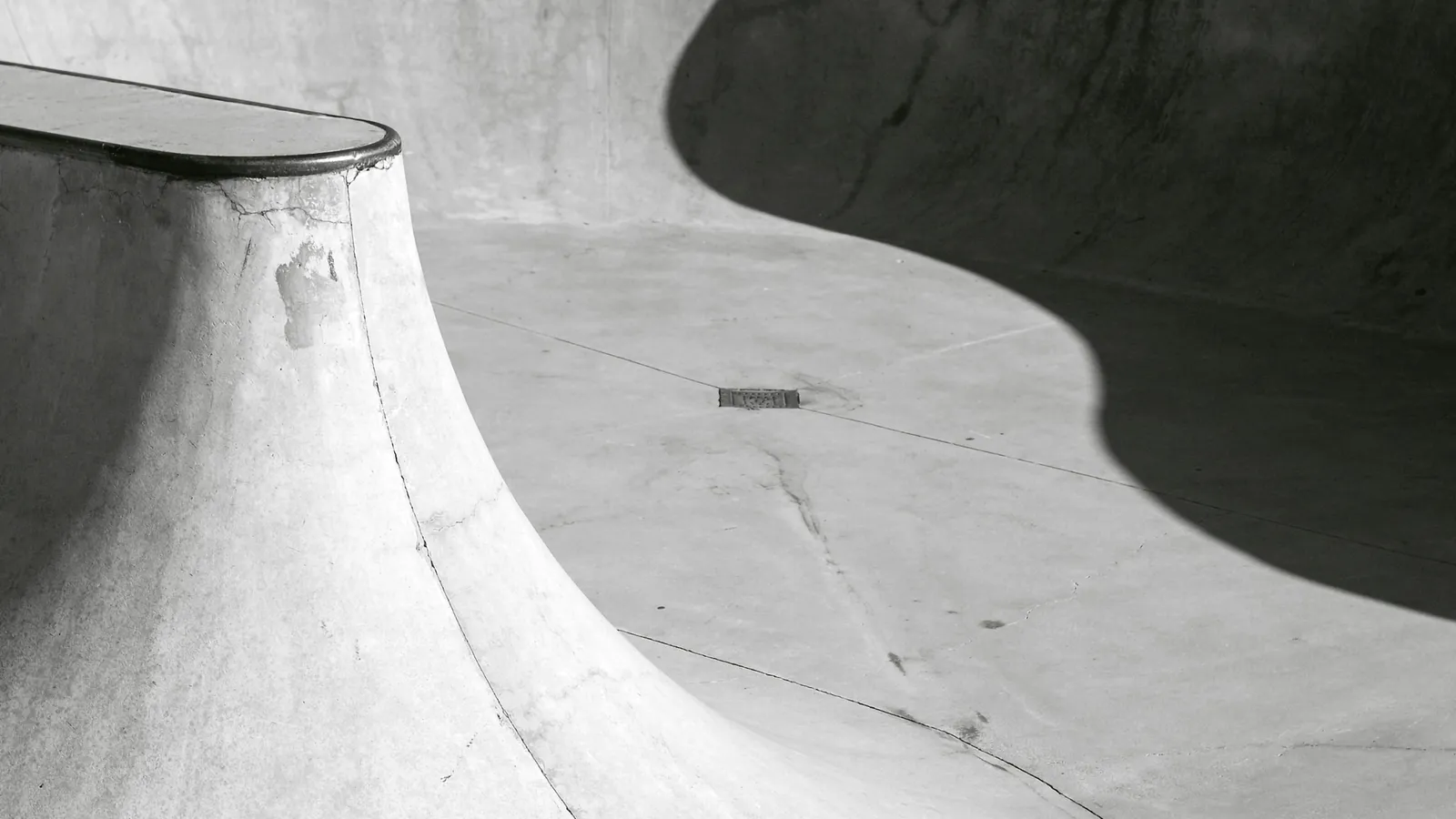 A smooth curved concrete skate bowl