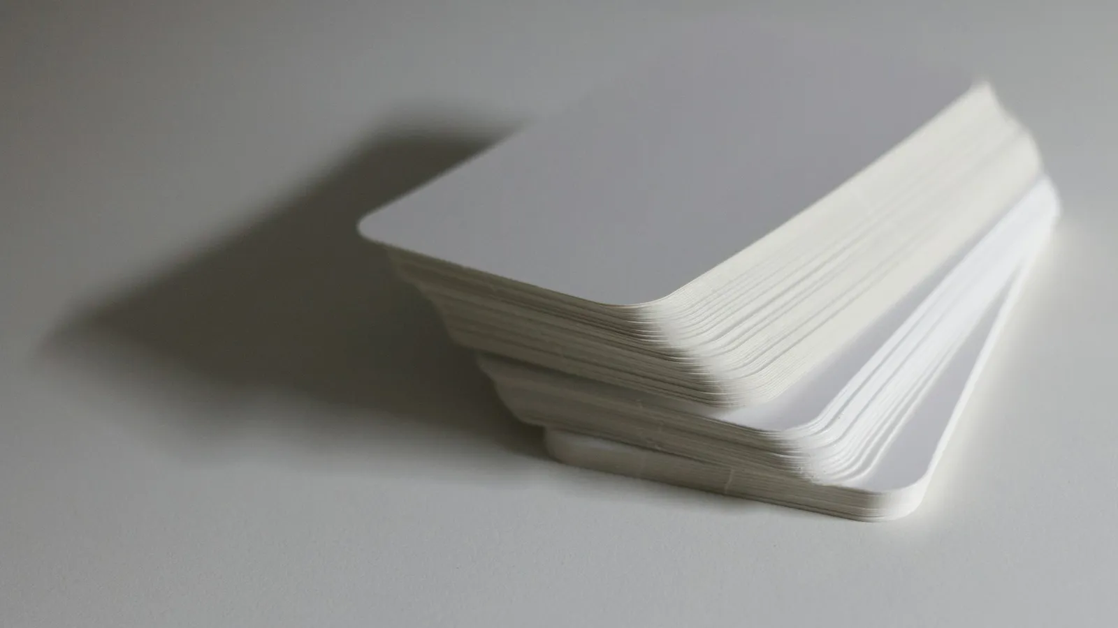 A stack of blank white flashcards