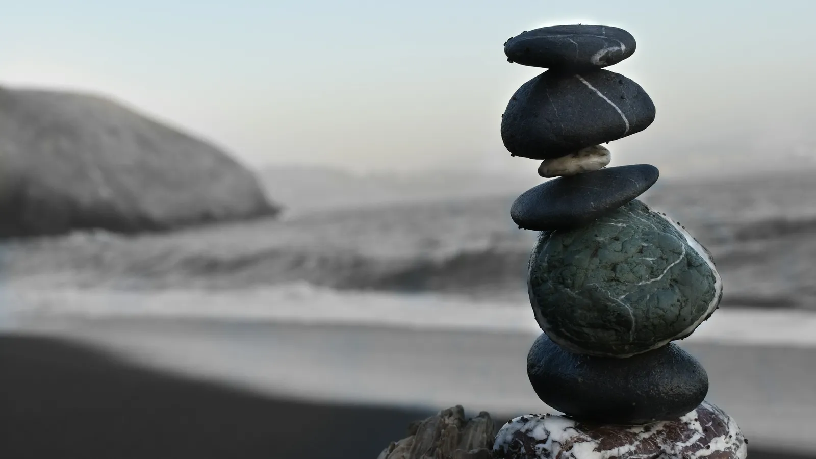 A stack of smooth stones balanced one on top of another