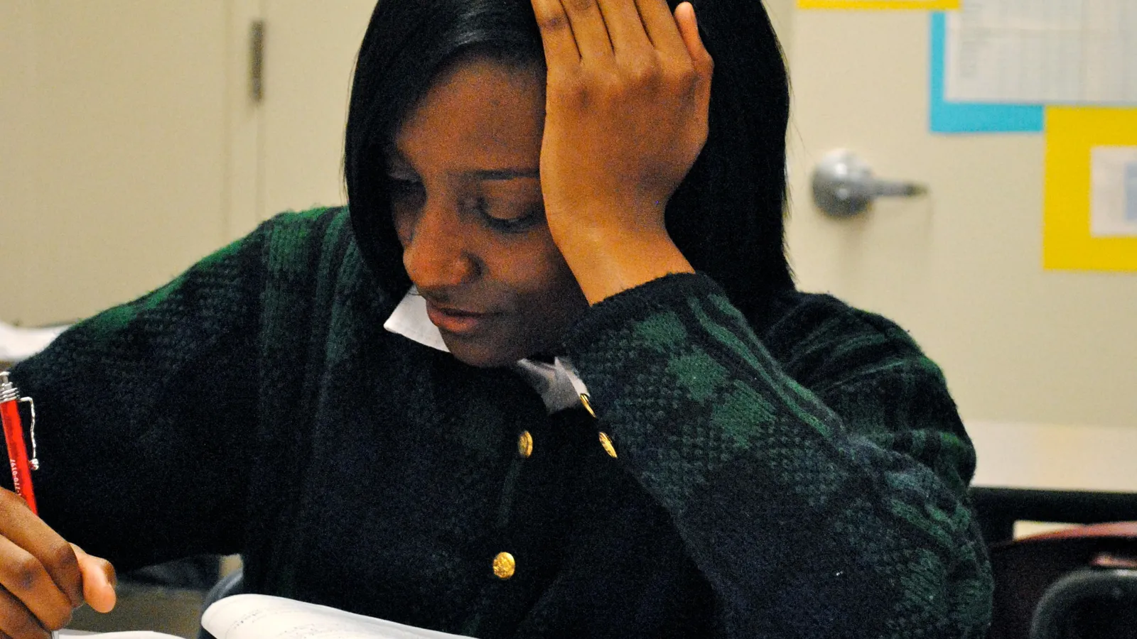 A student studying at a desk