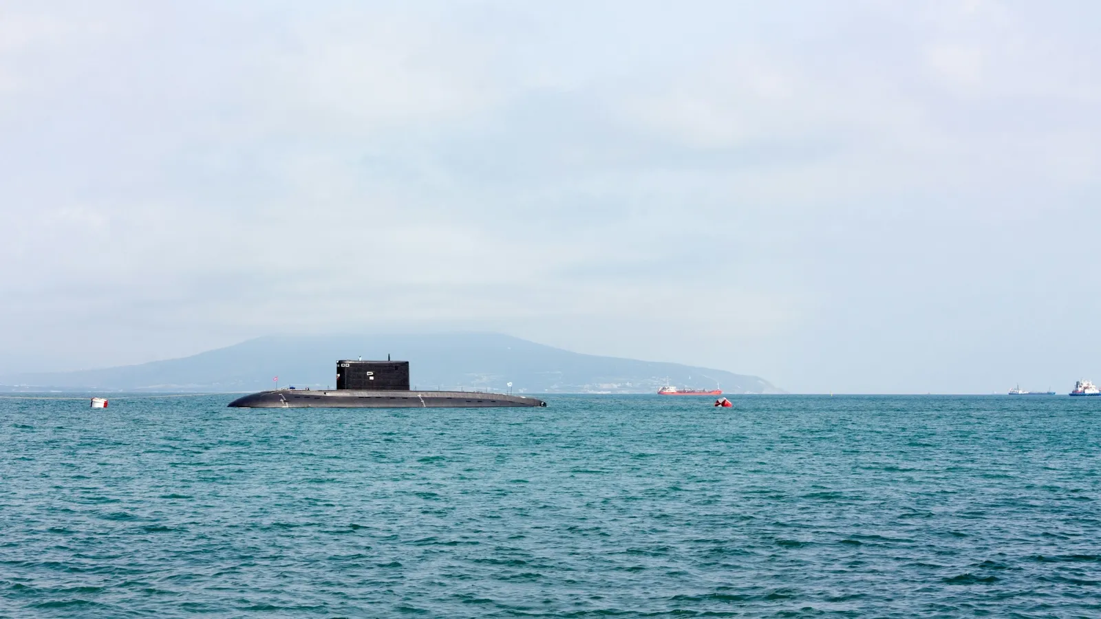 A submarine on the surface of a calm sea
