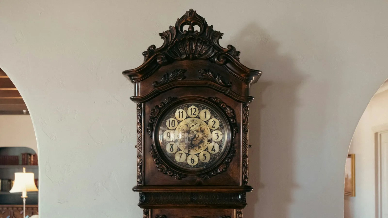 A tall wooden pendulum clock