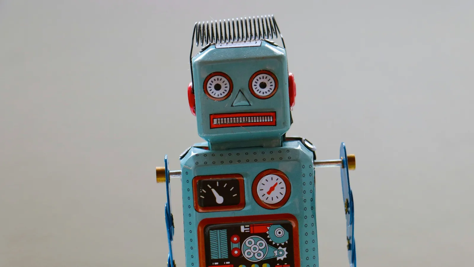 A vintage toy robot with dials on its chest