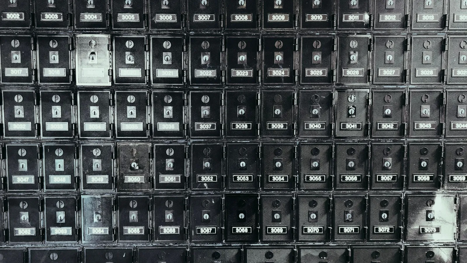 A wall display of element samples arranged like a periodic table