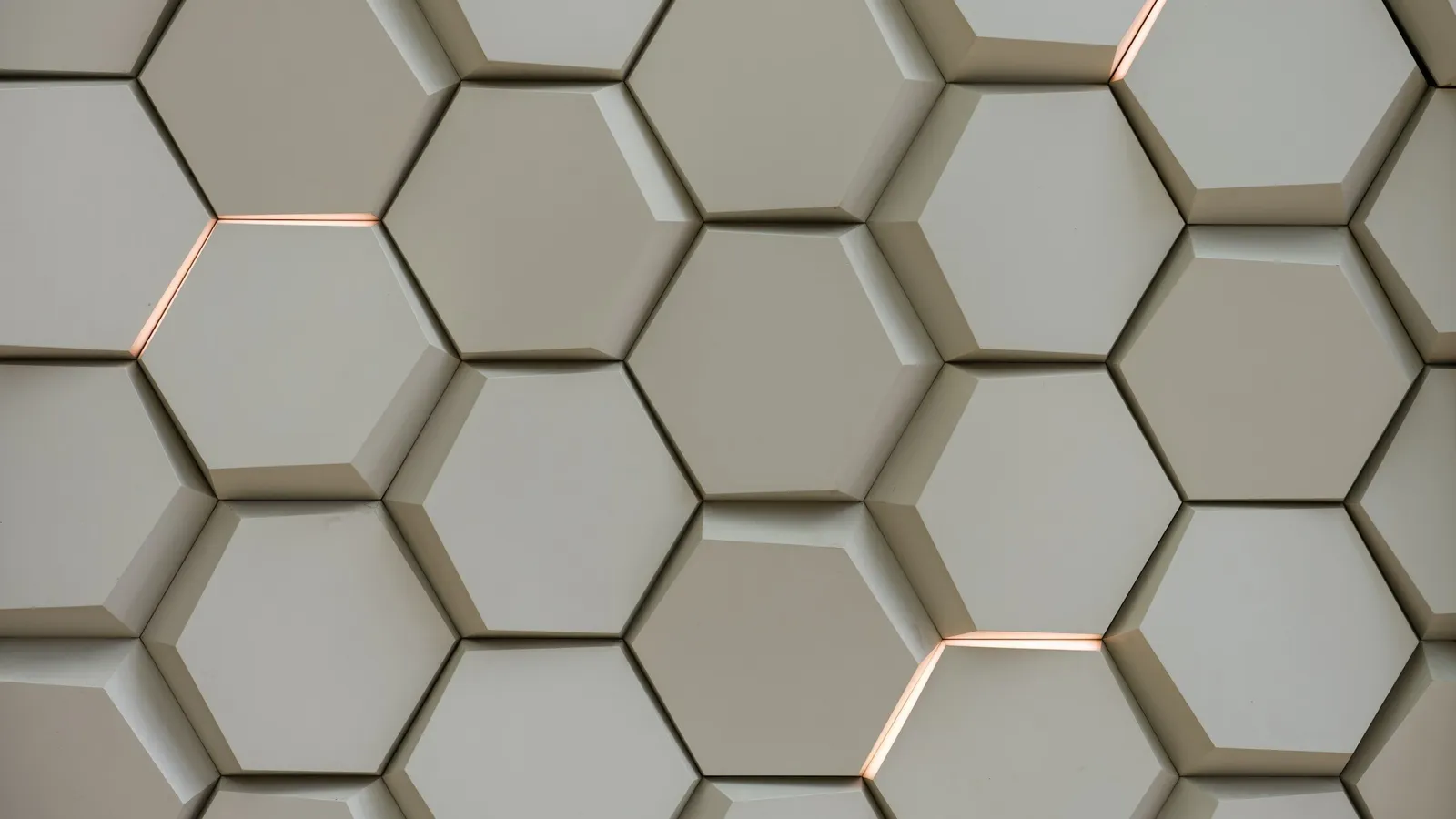 A wall of white hexagonal tiles