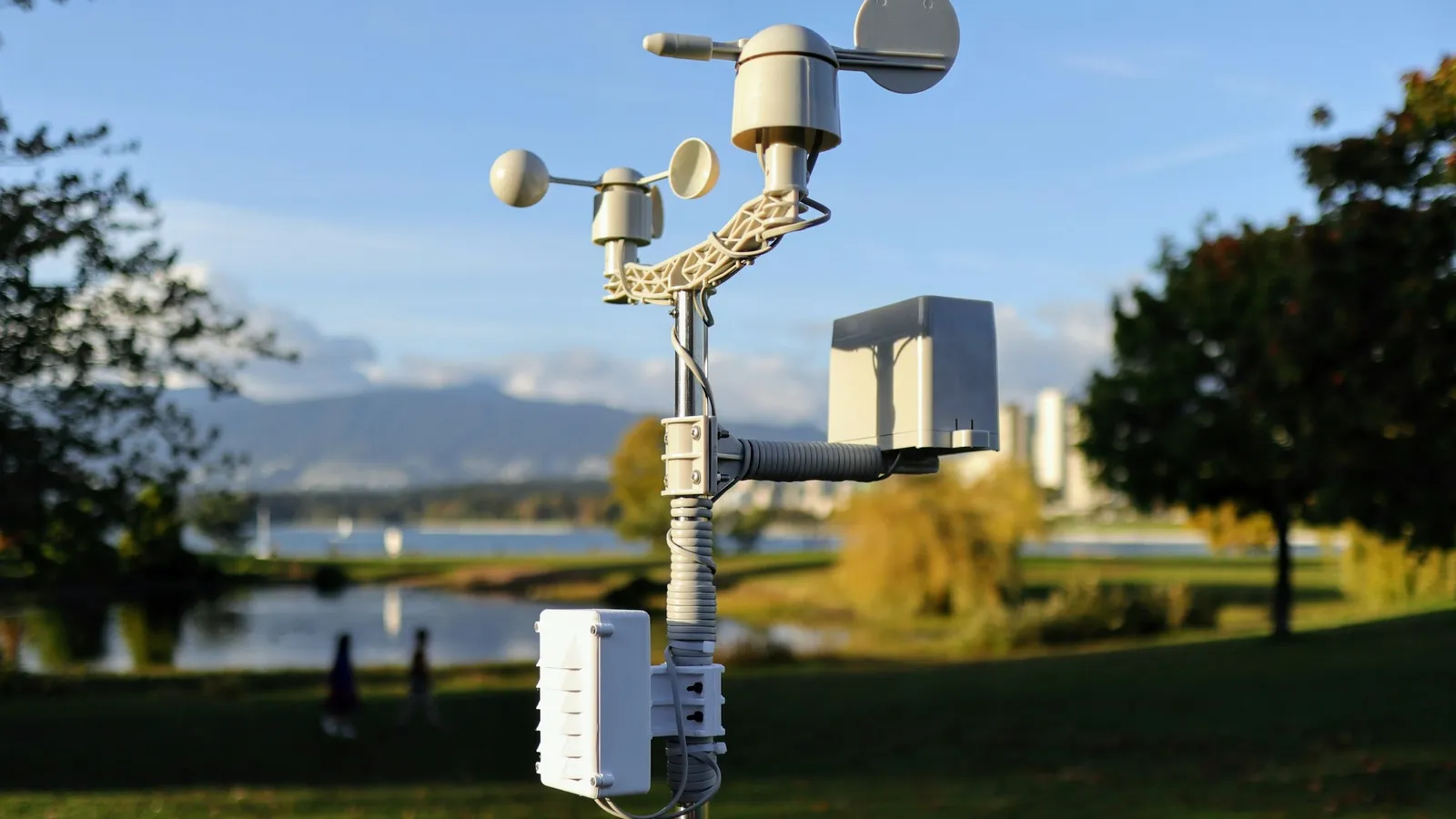 A weather station with instruments on a pole