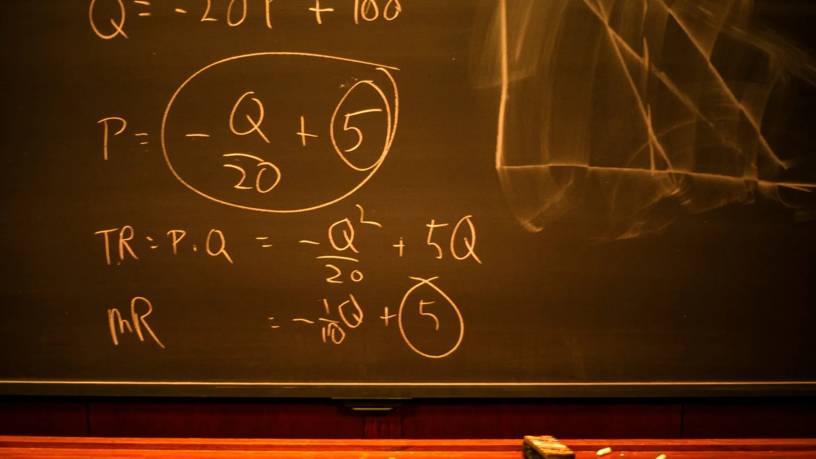 Algebra worked out on a chalkboard