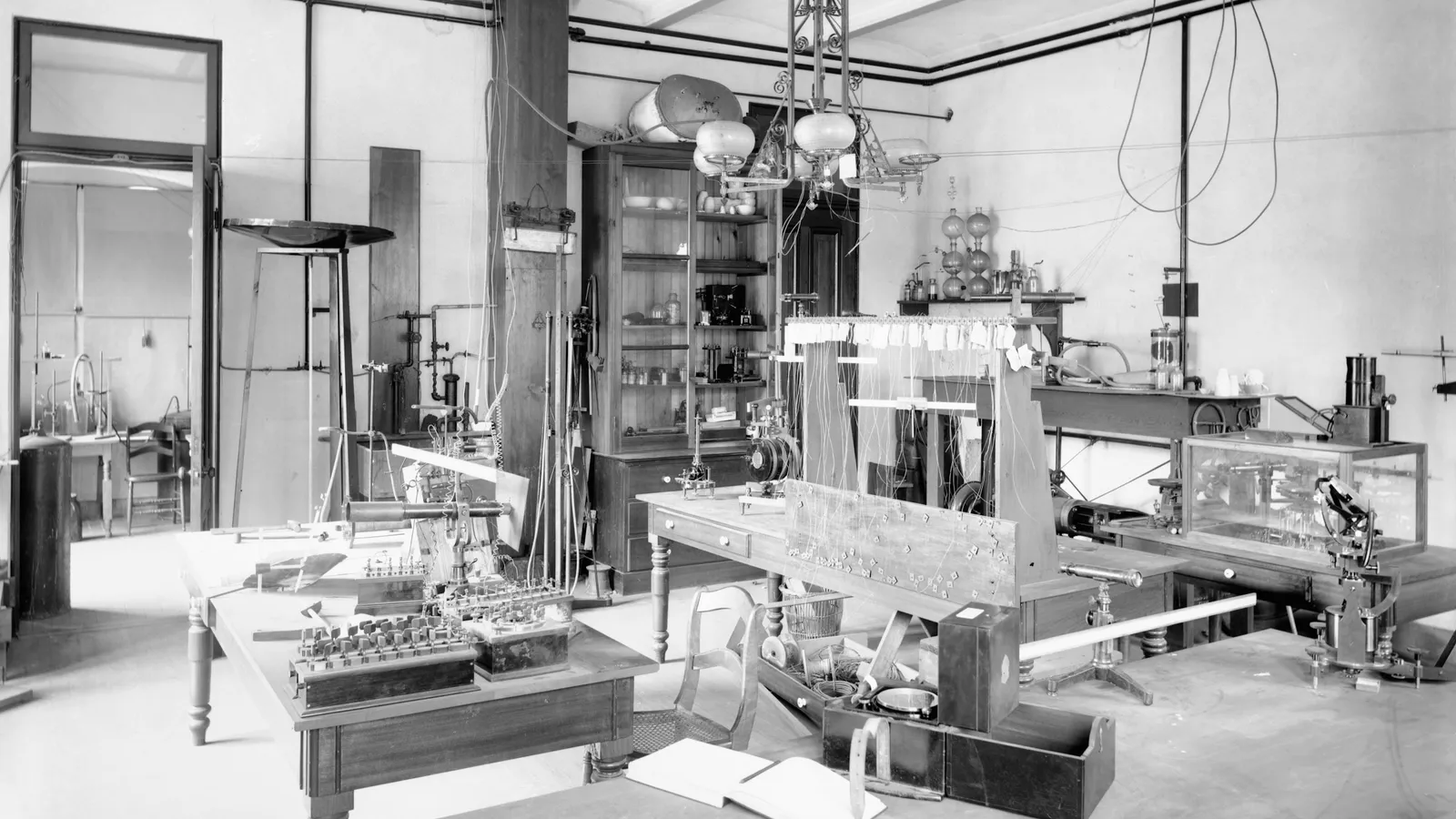 An early laboratory with large electrical apparatus, in black and white