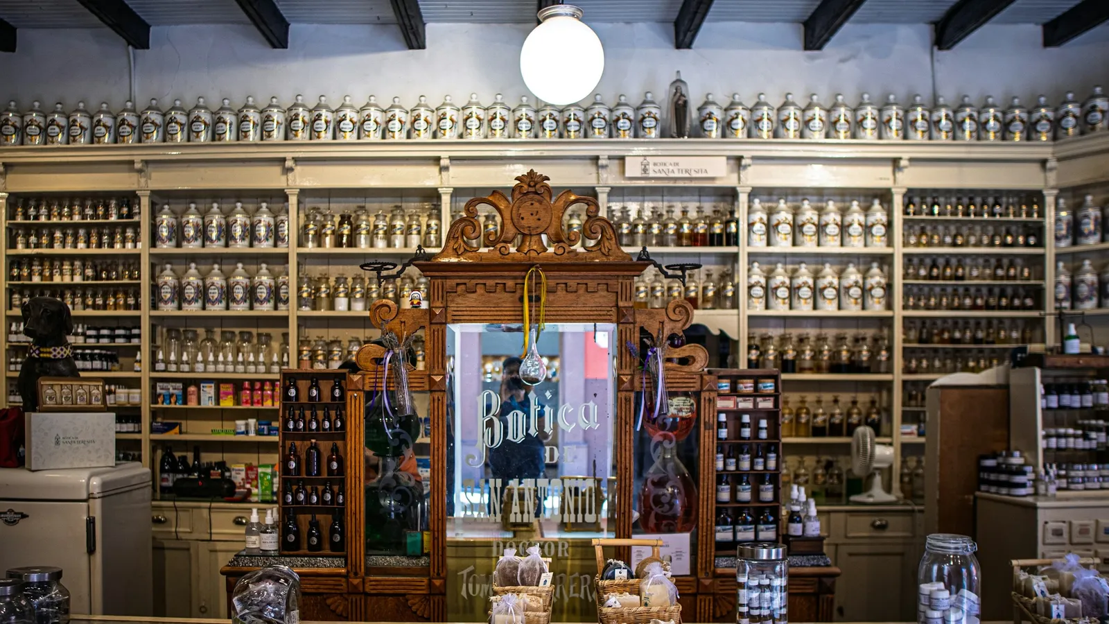 An old apothecary shop lined with jars and bottles
