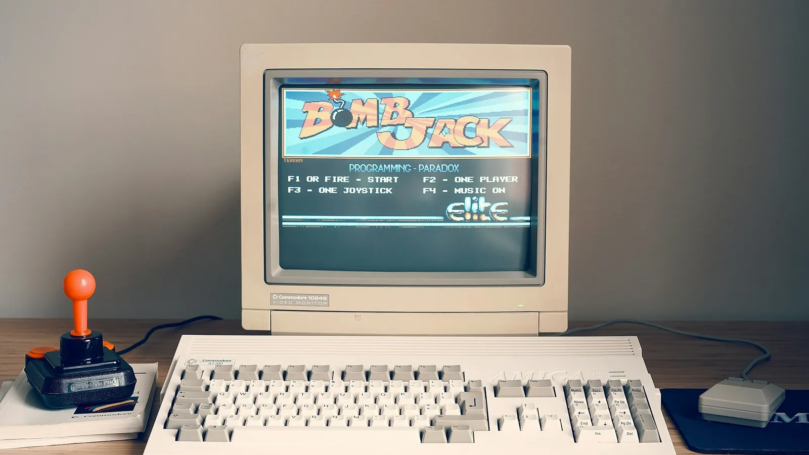 An old beige desktop computer and keyboard
