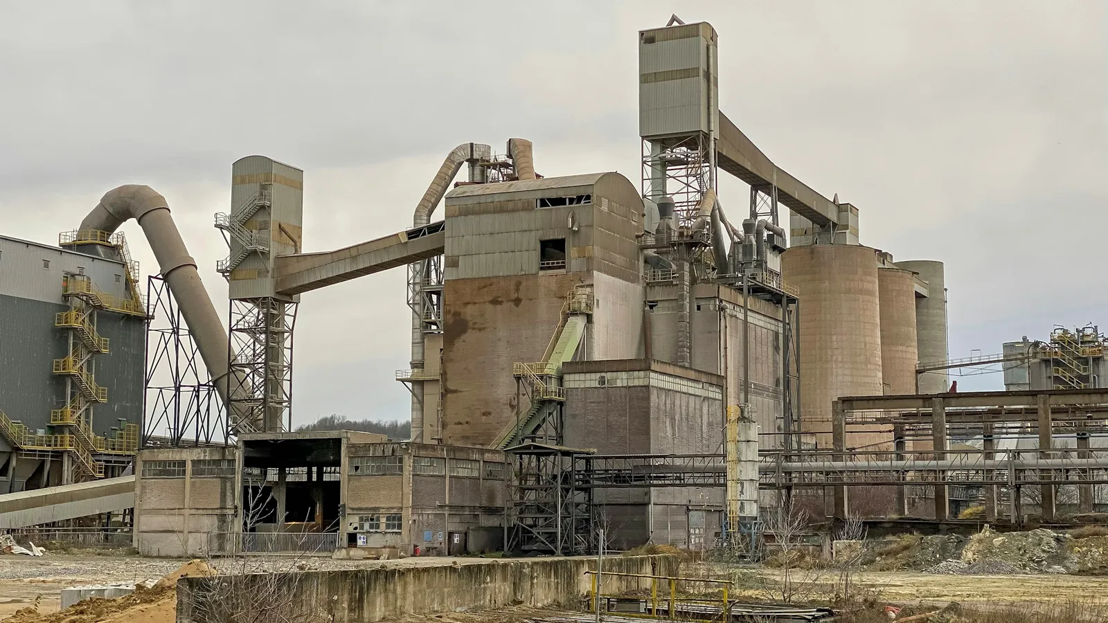 An old industrial chemical plant with tall silos