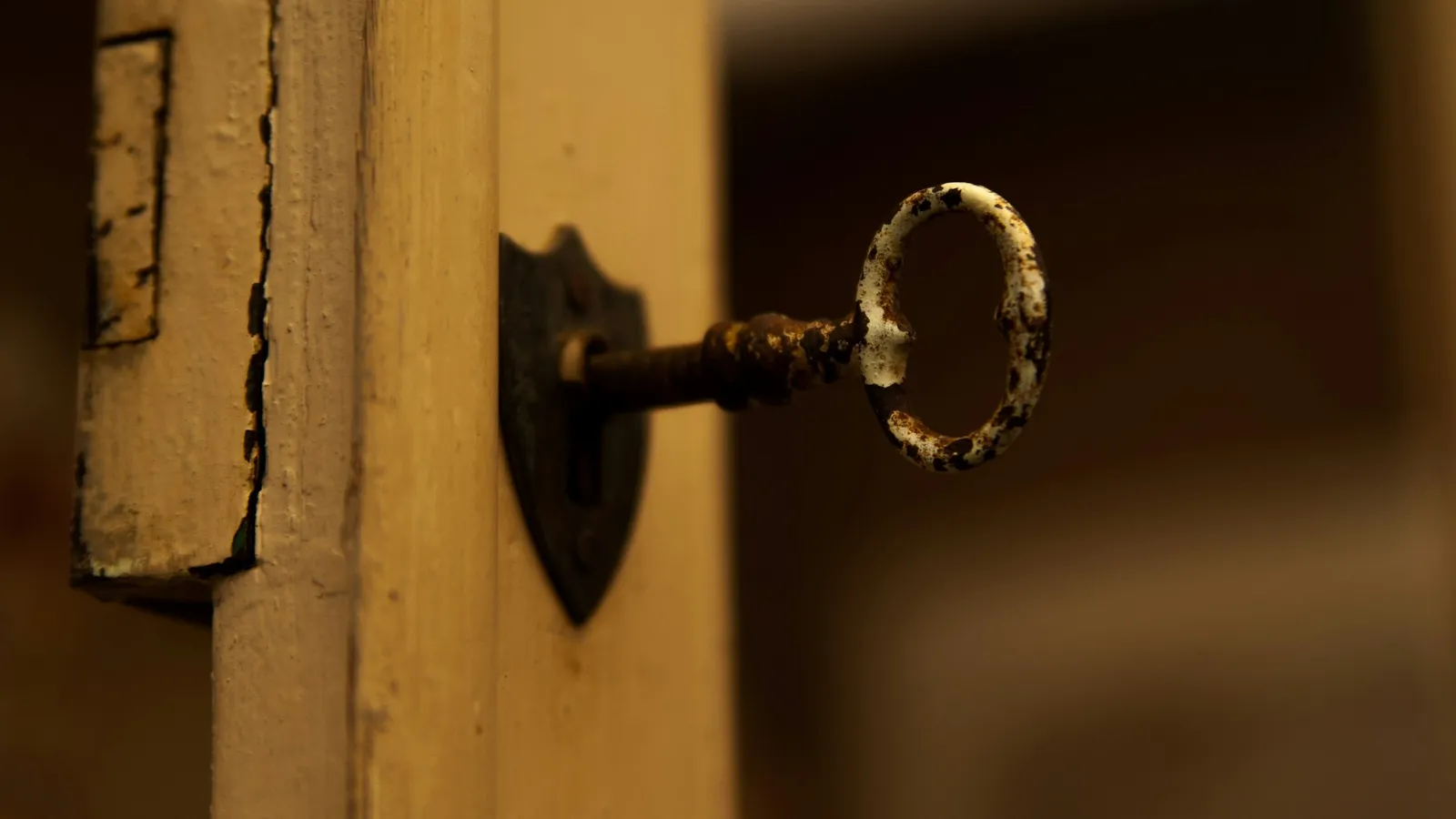 An old key turned in a keyhole