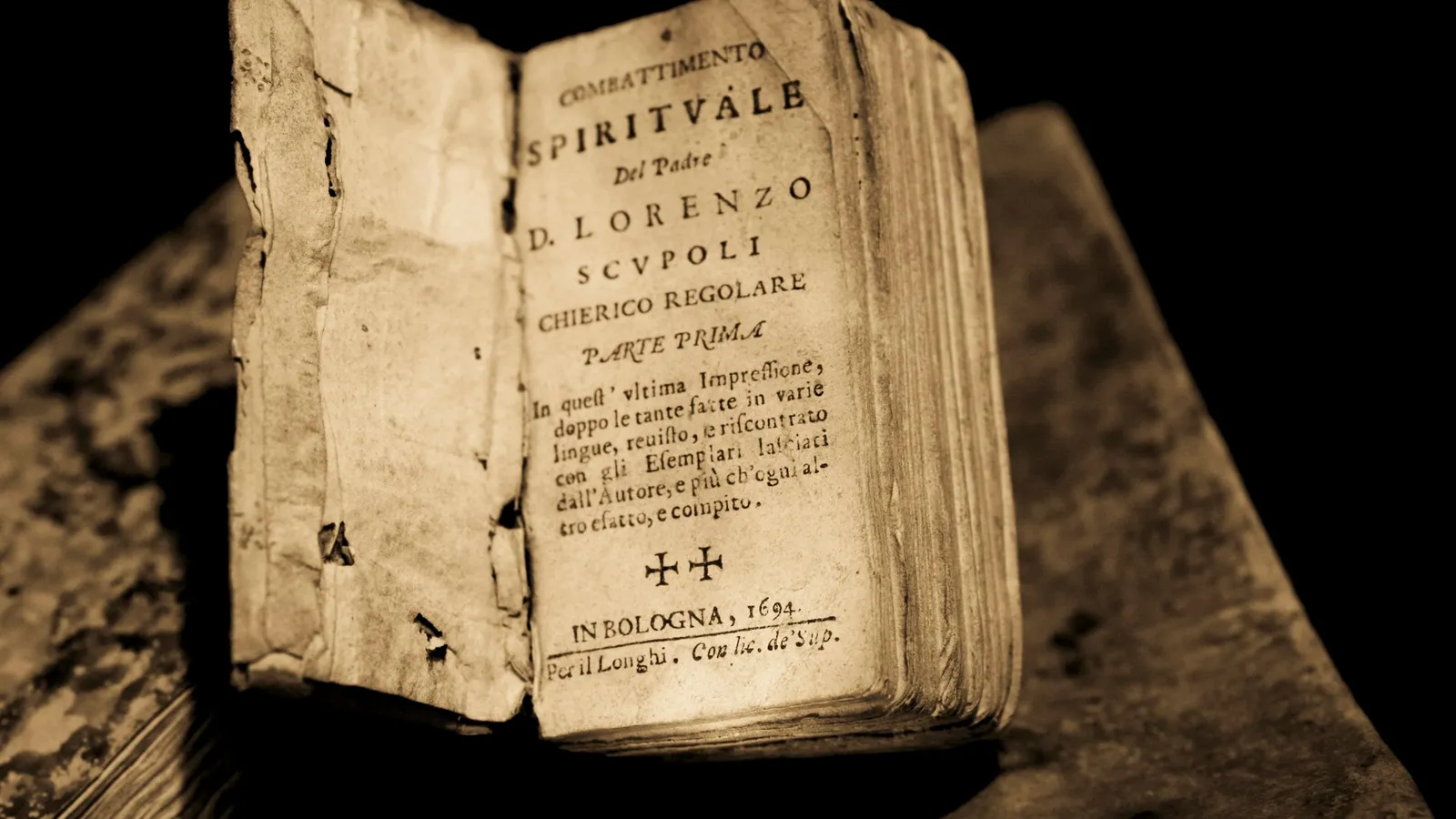 An old leather-bound book lying open