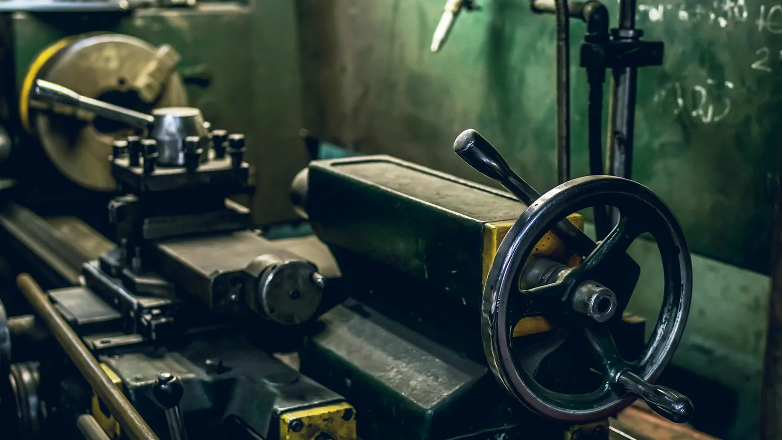 An old metal lathe in a workshop
