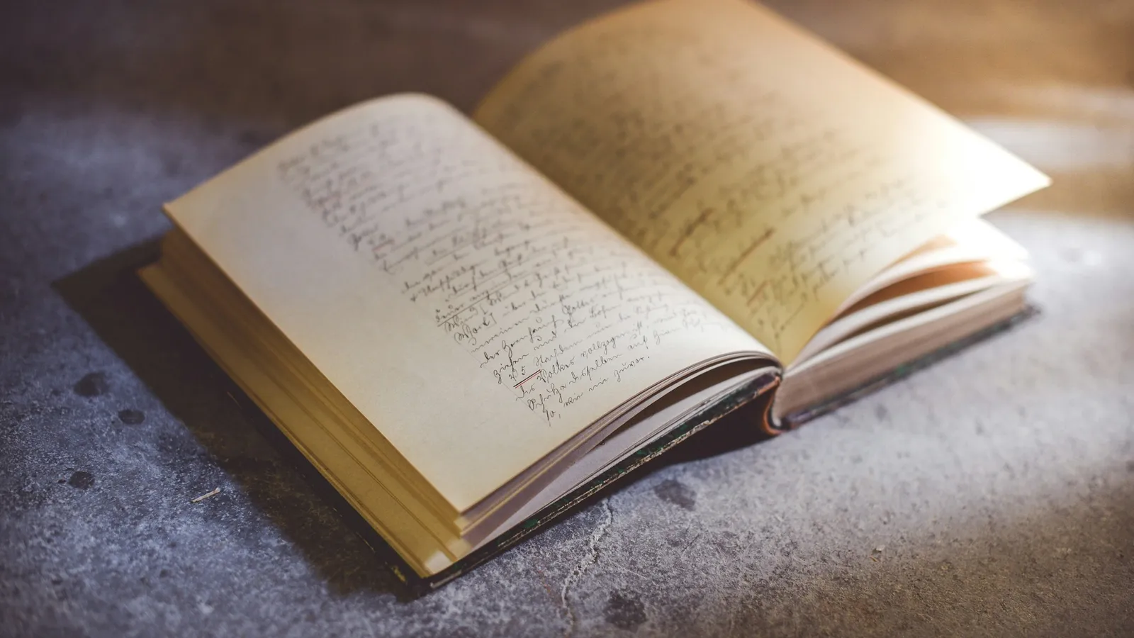 An old open book with yellowed pages