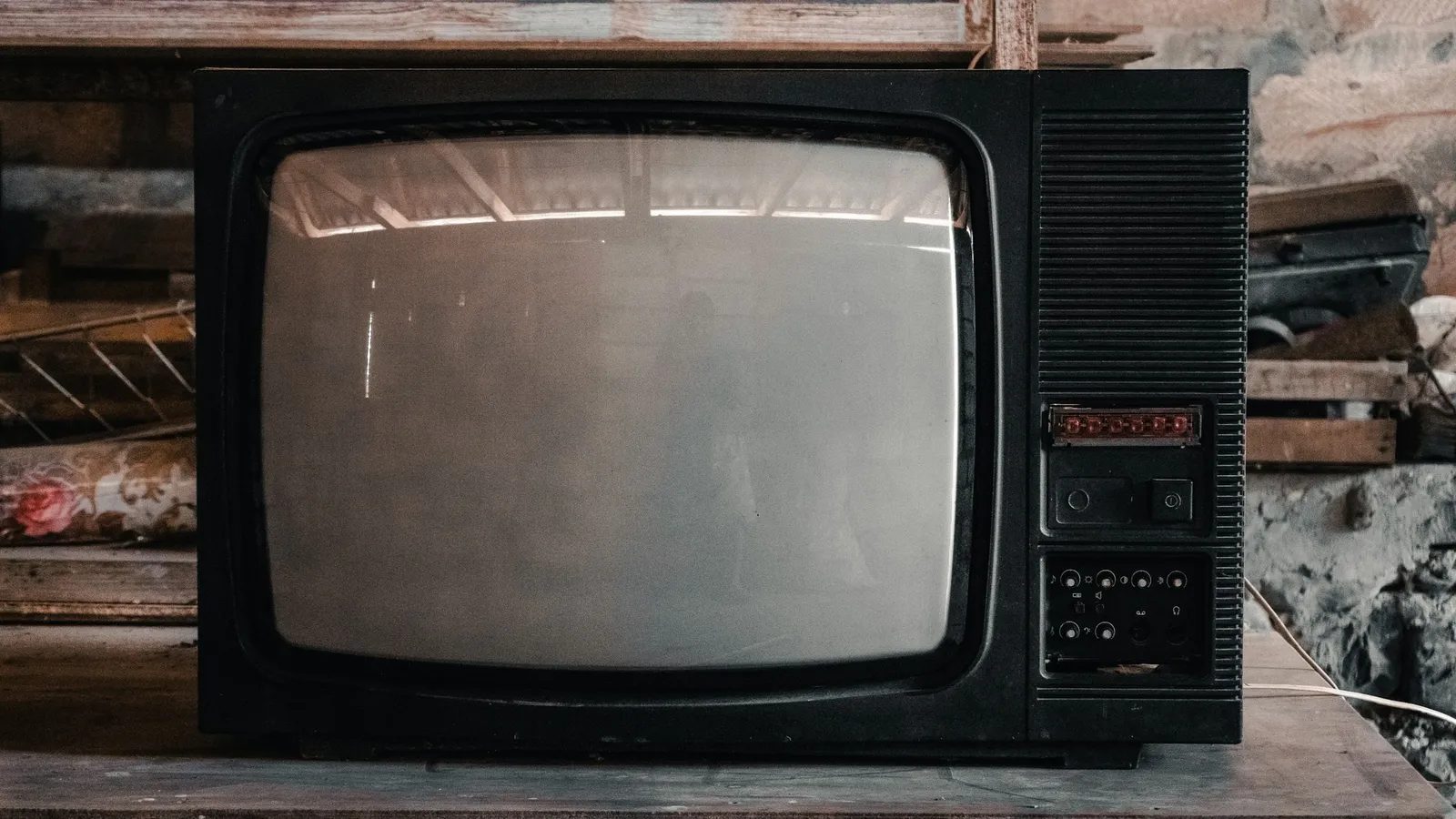 An old television set with a curved screen