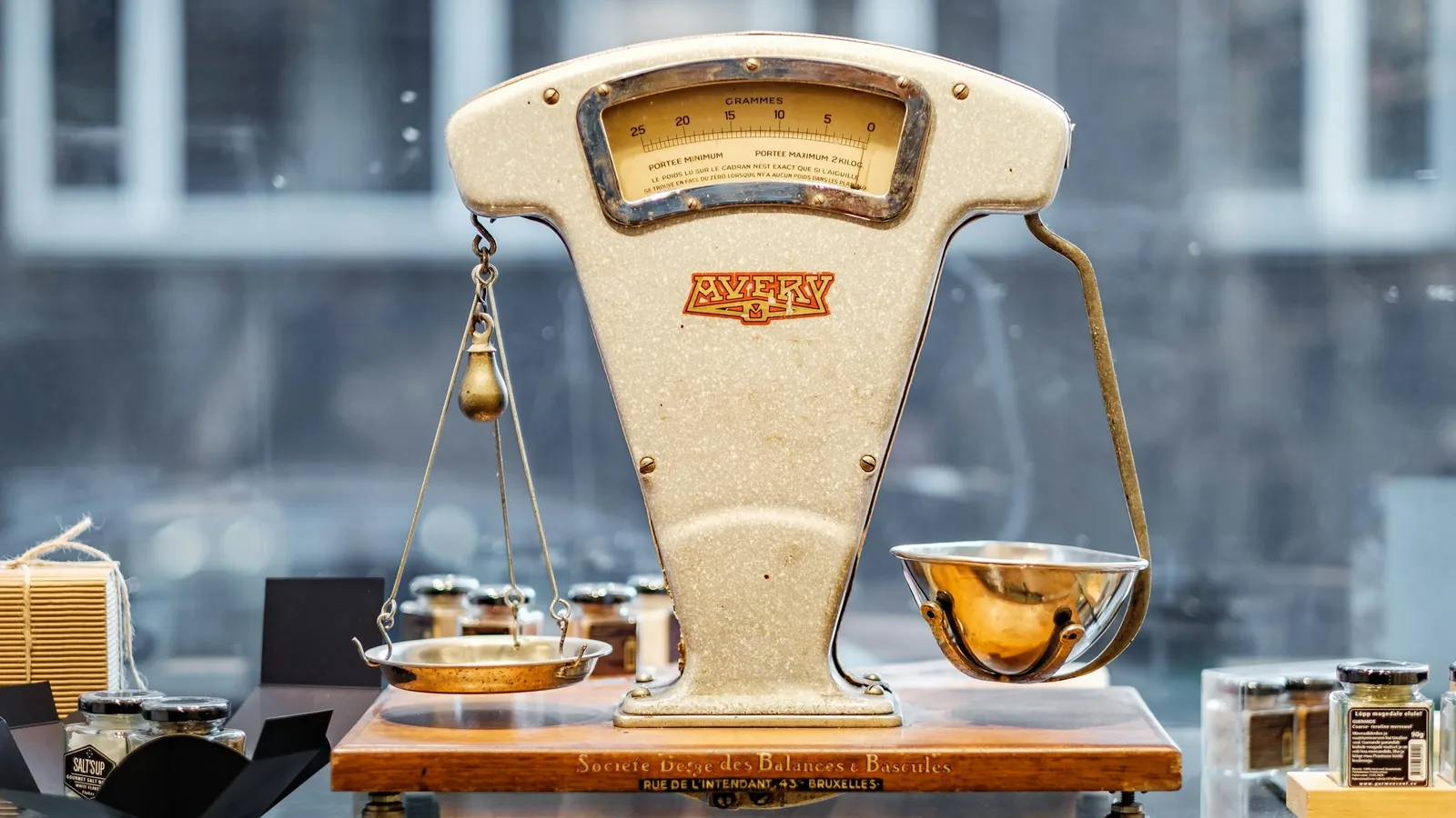 An old weighing scale with a needle dial