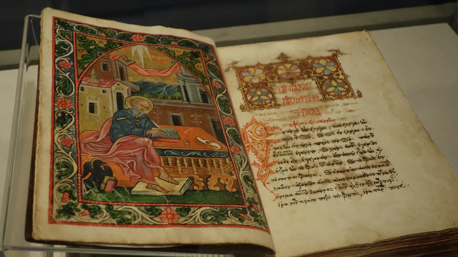 An open illuminated medieval manuscript