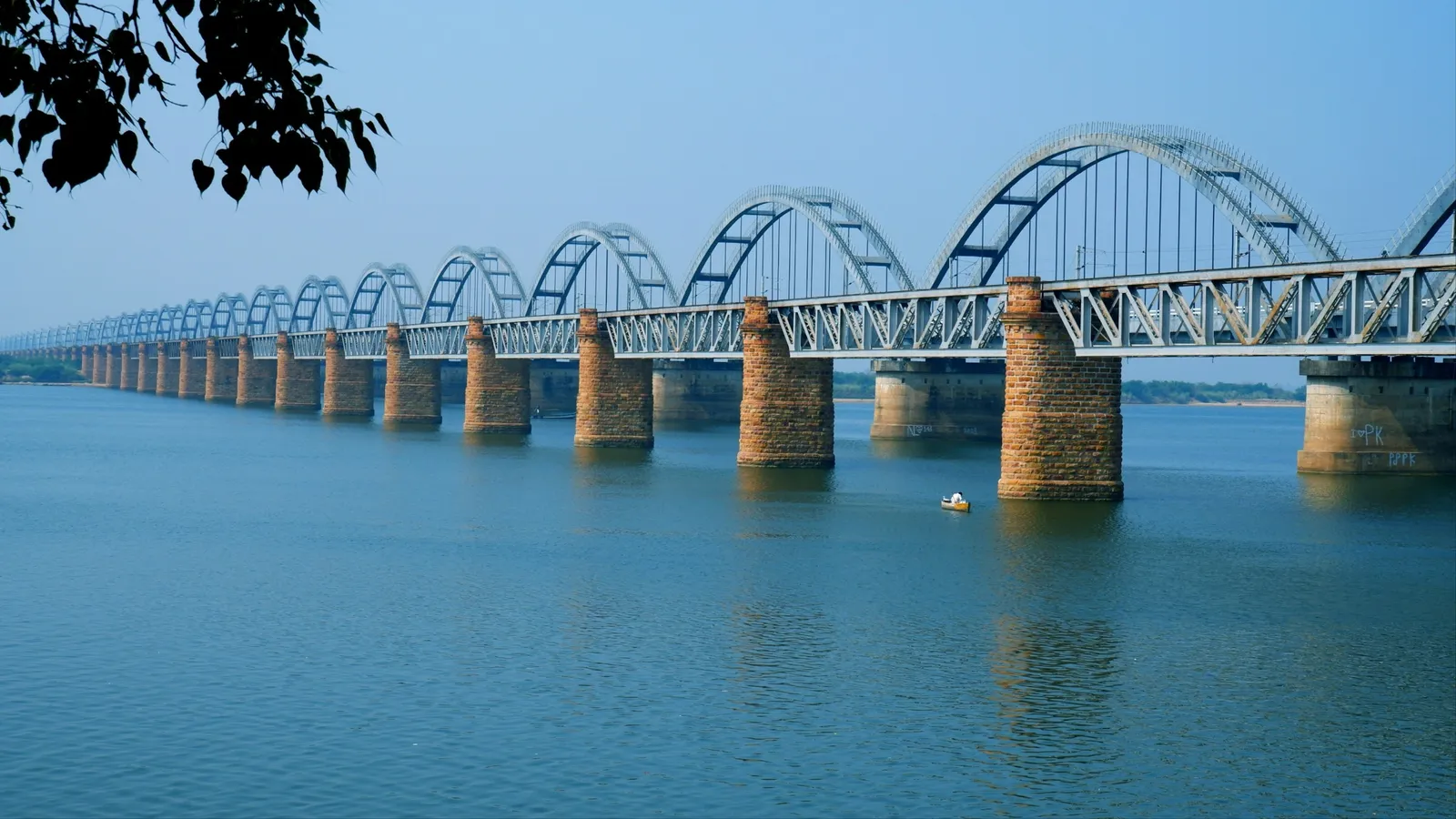 Arched bridges crossing the wide Godavari river