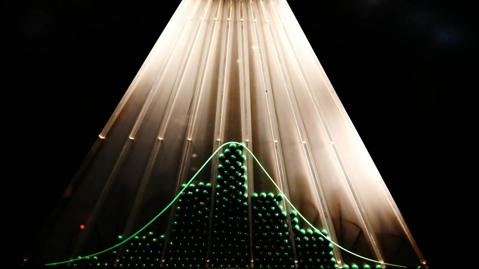 Beams of light spreading into a bell-shaped curve