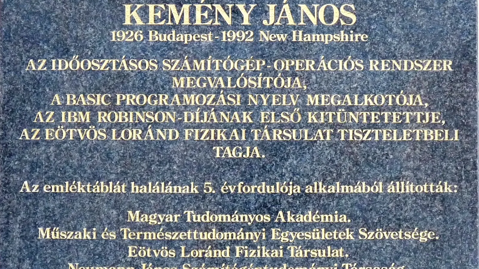 Budapest marble plaque marking John Kemeny's student home and naming him creator of BASIC