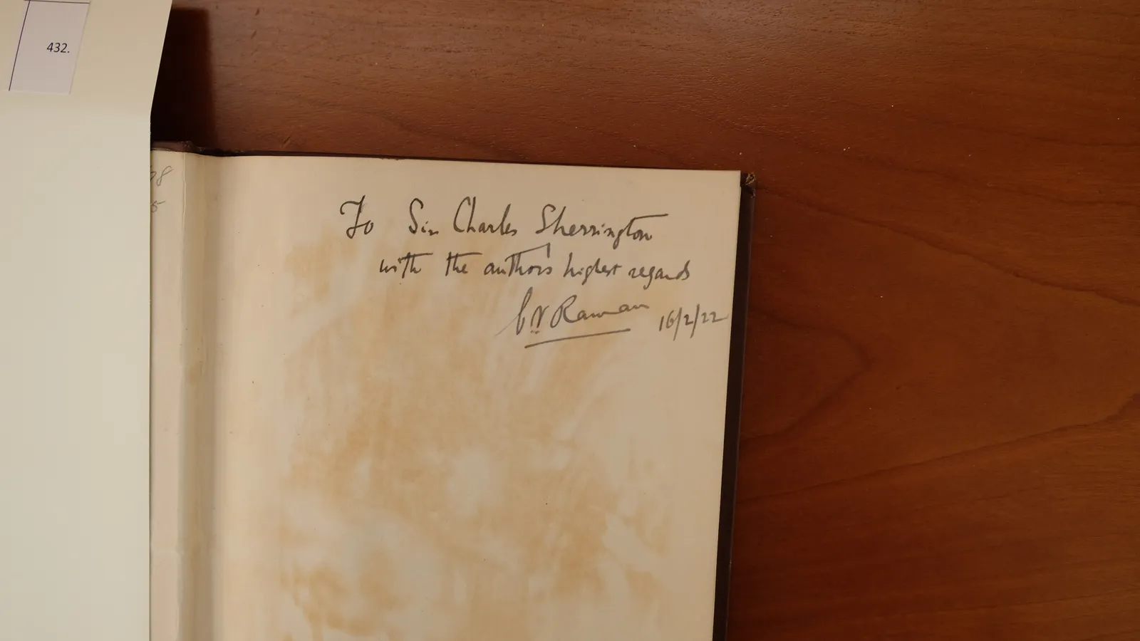 C. V. Raman's signed 1922 dedication to Sir Charles Sherrington inside his book