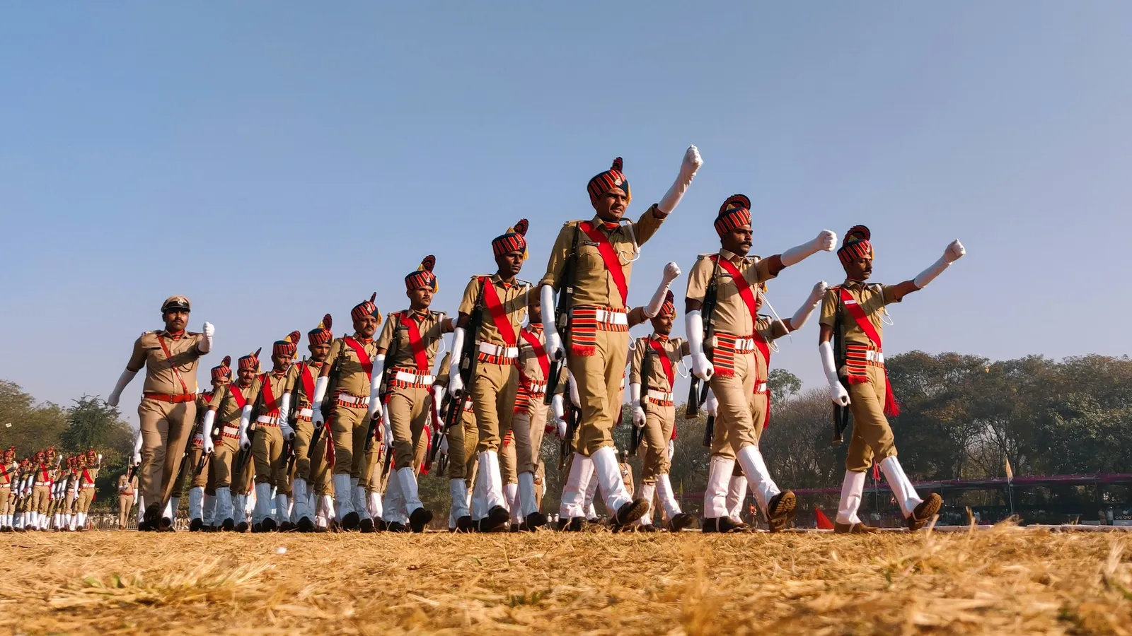 Cadets marching in formation on a parade ground