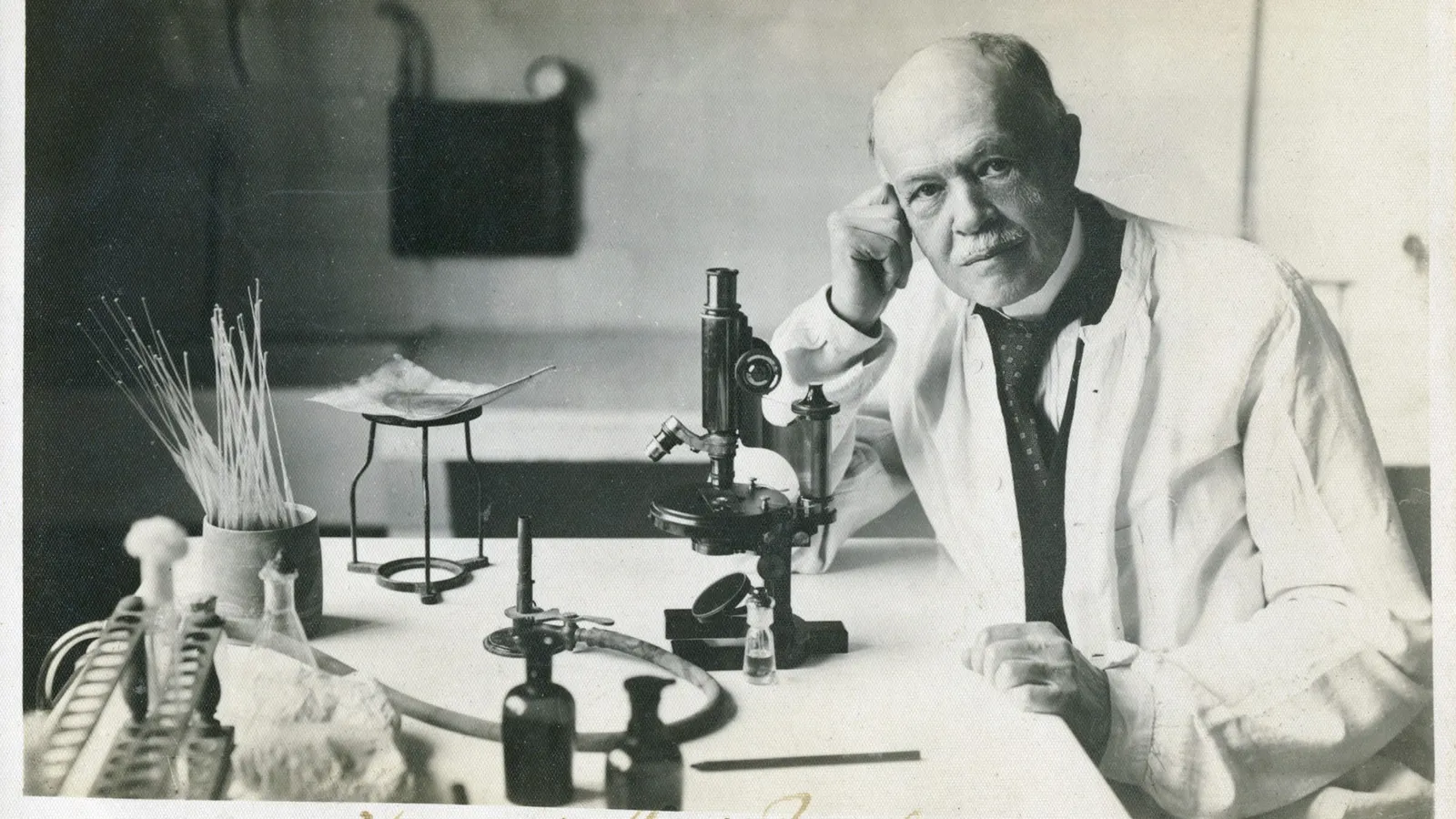 Charles Nicolle working at his microscope