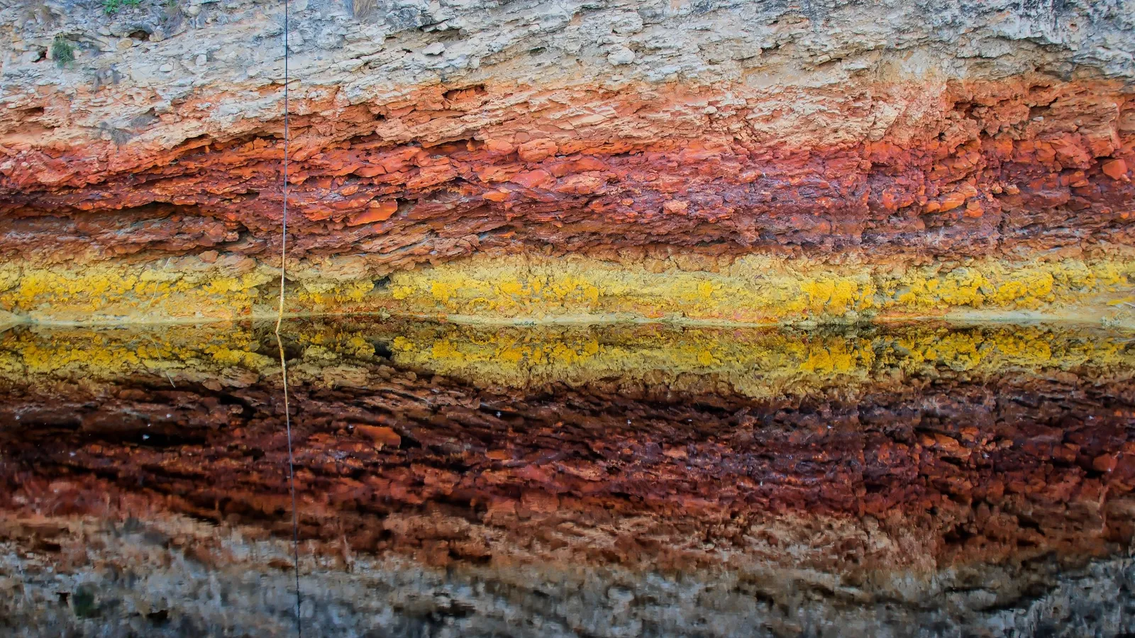 Coloured layers of rock stacked in bands