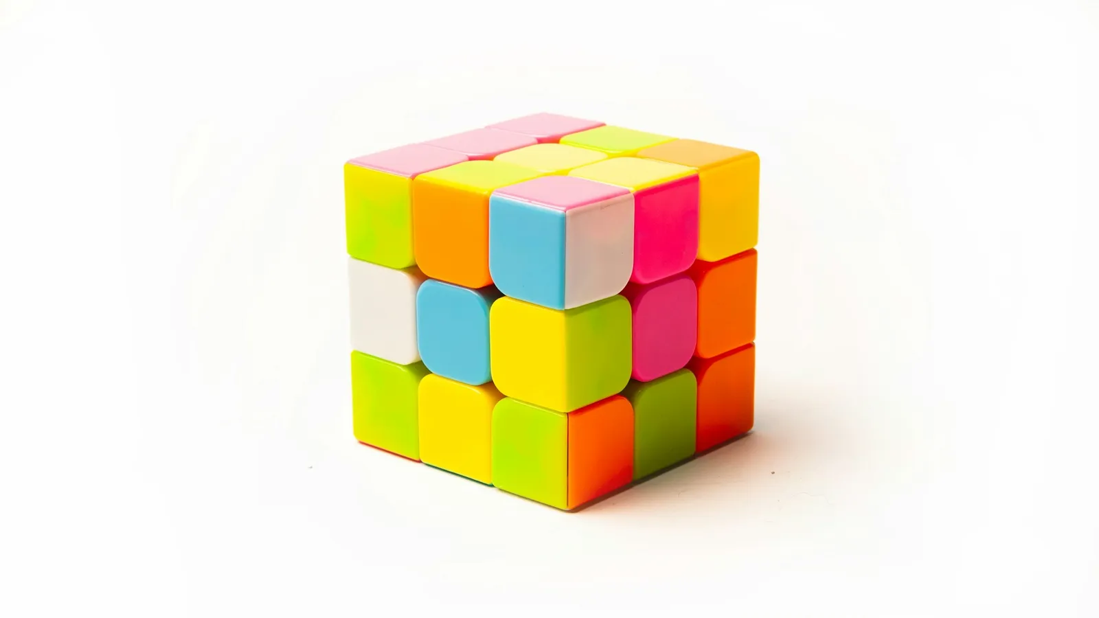 Colourful puzzle cube on a white background