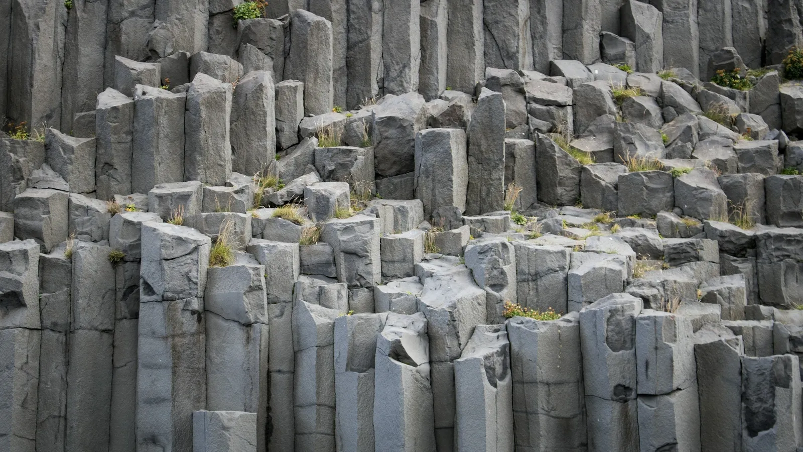 Columns of dark basalt rock